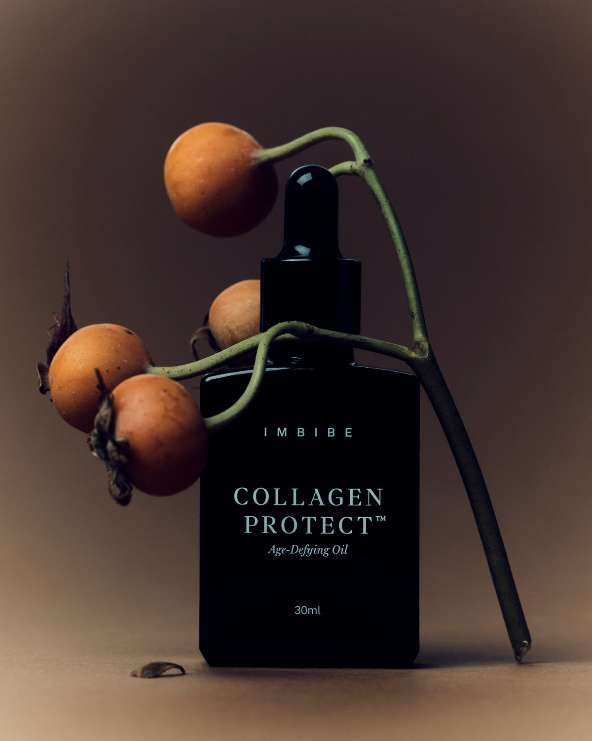 IMBIBE Collagen Protect Age-Defying Oil applied to skin