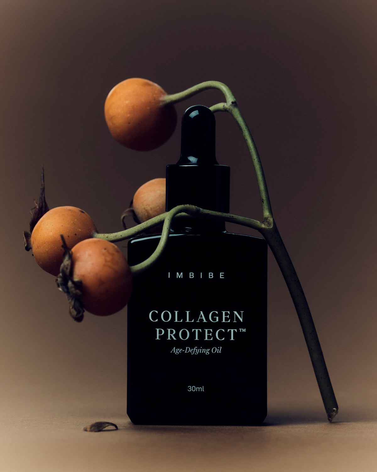 IMBIBE Collagen Protect Age-Defying Oil bottle on display