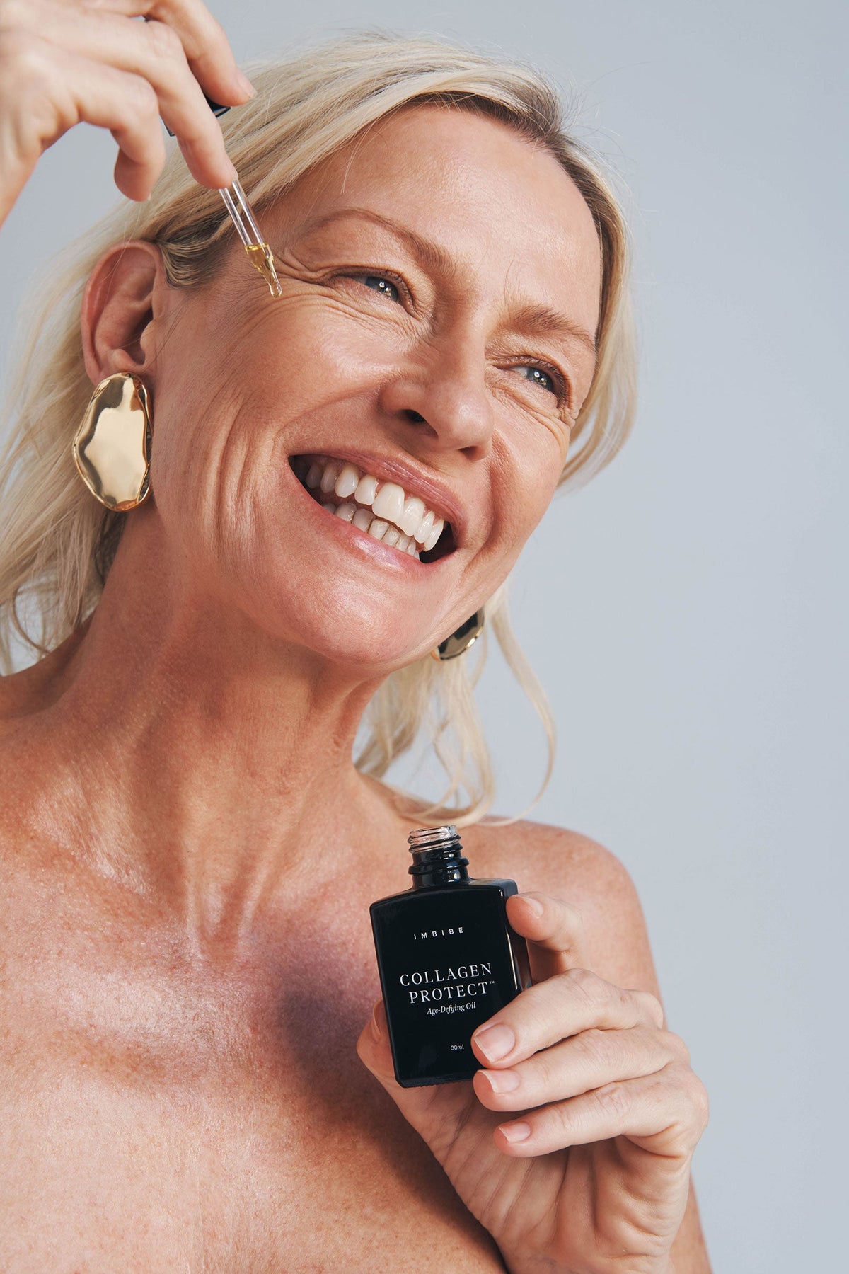 IMBIBE Collagen Protect Age-Defying Oil texture and packaging detail